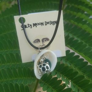 * Natural shell necklace with turtle charm.